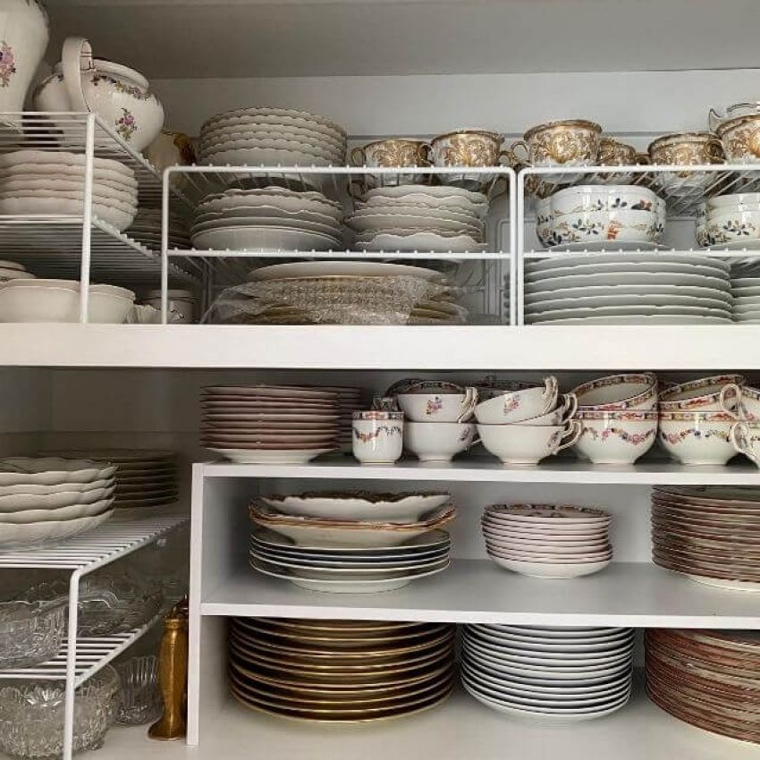 organized cabinet with china and dishes